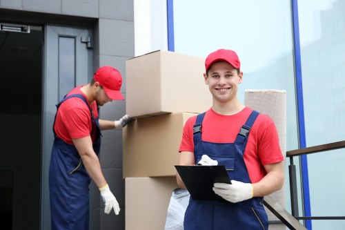 Company van and crew preparing for rubbish collection