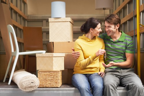 Worker preparing items for removal in a house clearance